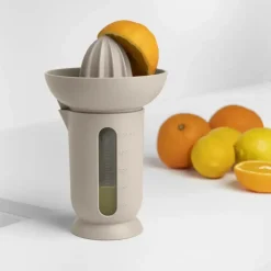 BLIM PLUS Wyciskarka do cytrusów z dzbankiem 0,5 l brązowa / produkt innowacyjny